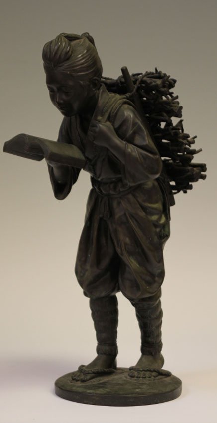 MEIJI PERIOD BRONZE FIGURE OF OKIMONO: Ninomiyo Kintiro, with stamp mark 19th century Height- 18 1/2" Condition- original patina