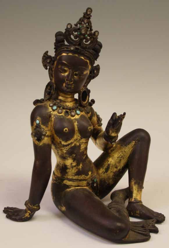 SOUTHEAST ASIAN BRONZE UMA FIGURE, 20TH CENTURY: reproduction of 9th-10th century Nepalese original Height- 13 1/2" Condition- loss to patina