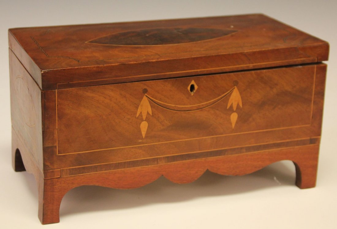 SHERATON MAHOGANY INLAID FOOTED TEA BOX: Height- 6", Length- 12" Note- Israel Sack gallery label