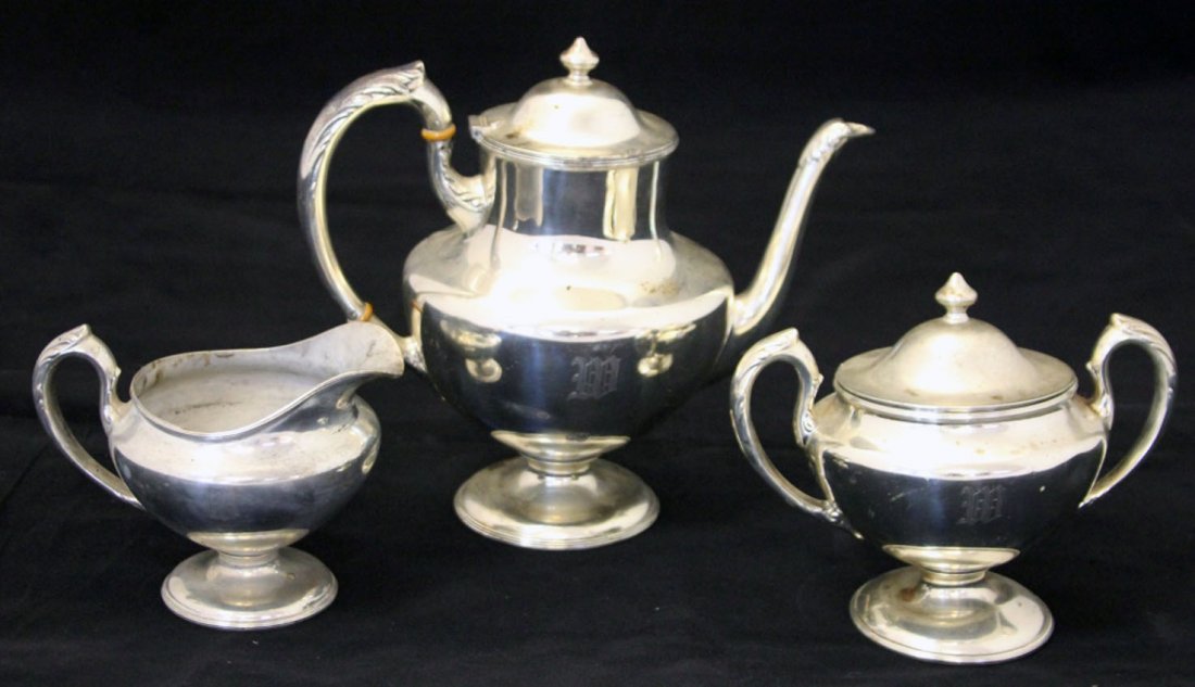 SHREVE, CRUMP AND LOW, STERLING 3PC. TEA SERVICE: Monogramed with the letter W Weight- 49 troy oz. Condition- dent on one of the pieces, pitting, some tarnish