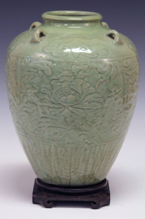 EARLY CHINESE CELADON VESSEL: 19th century or earlier Height of vessel only- 12" Condition- cracks on bottom