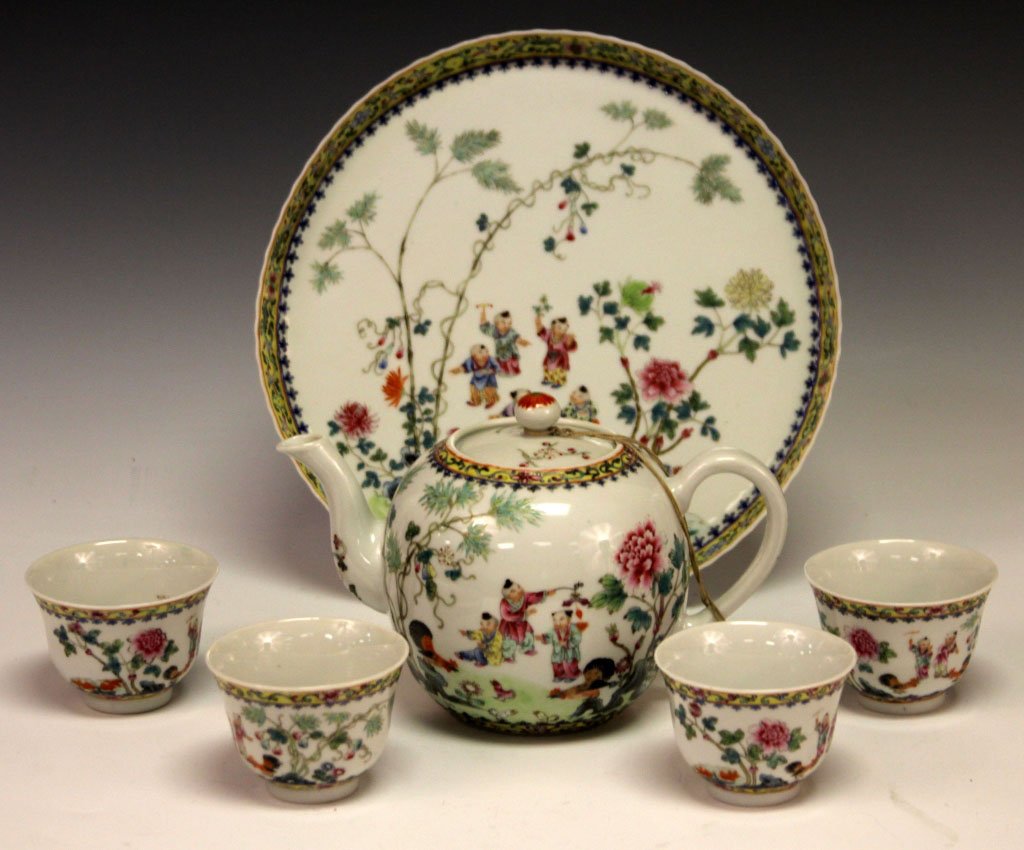 CHINESE PORCELAIN TEA SERVICE: Tray, teapot, (4) cups Diameter of tray- 10 3/4"