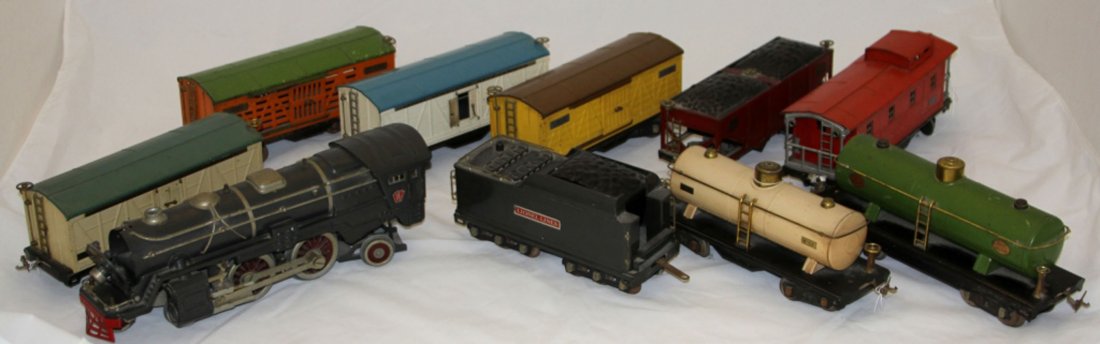 LIONEL ENGINE AND TENER WITH (8) CARS: Model numbers- 392W, 392E, 515, 513, 514, 516, 517,514R, 215, 514 Condition- all over scratches, original paint