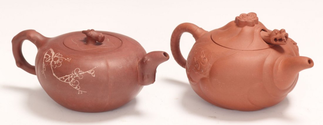 LOT OF (2) CHINESE CLAY TEAPOTS: Length- 3 1/2" - 4" Condition- hairline crack near spout on one and some restoration