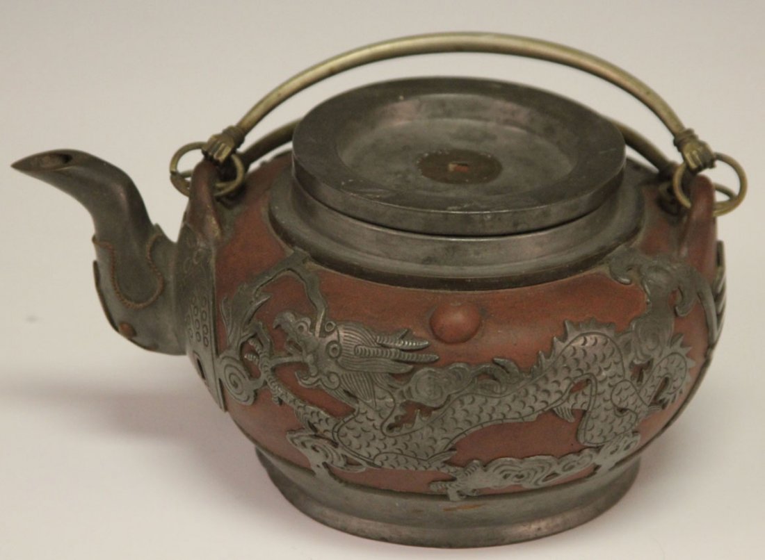 VINTAGE CHINESE PEWTER AND CLAY TEAPOT: Length- 7 7/8" Condition- missing top