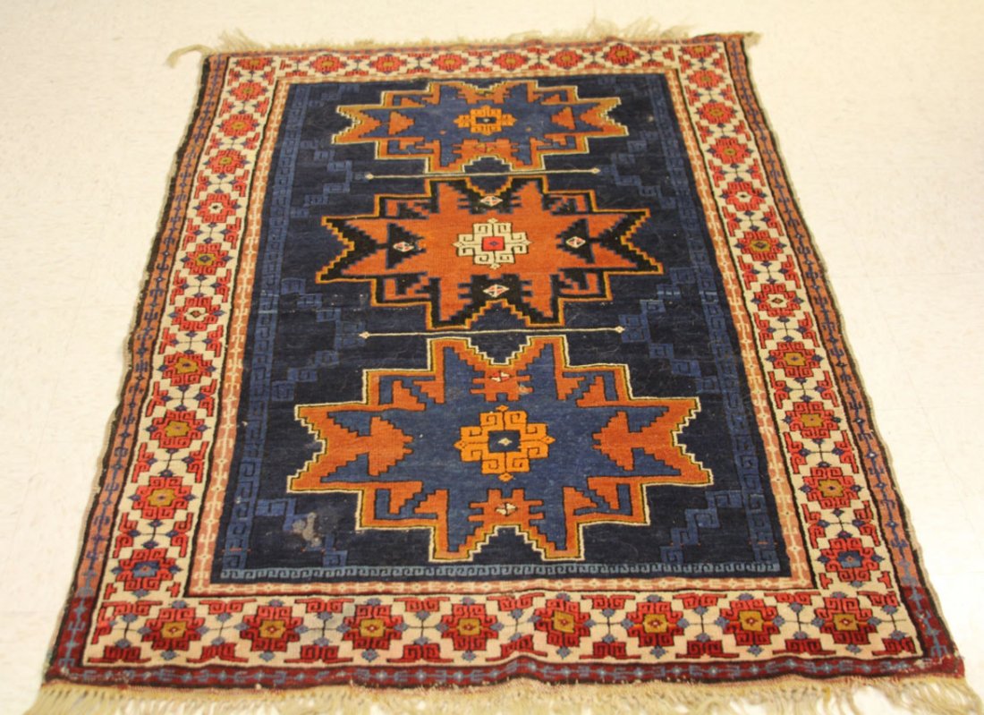 EARLY CAUCASIAN CARPET: Overall- 42" x 62"