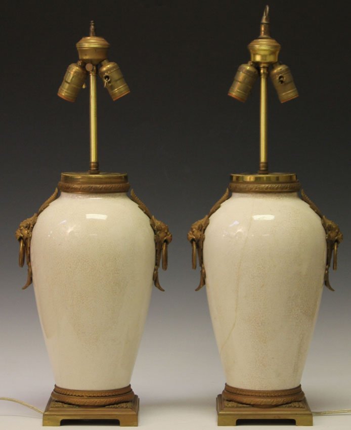 PAIR OF FRENCH PORCELAIN AND METAL MOUNT LAMPS: Overall height- 26 1/2" Condition- hairlines, some restoration