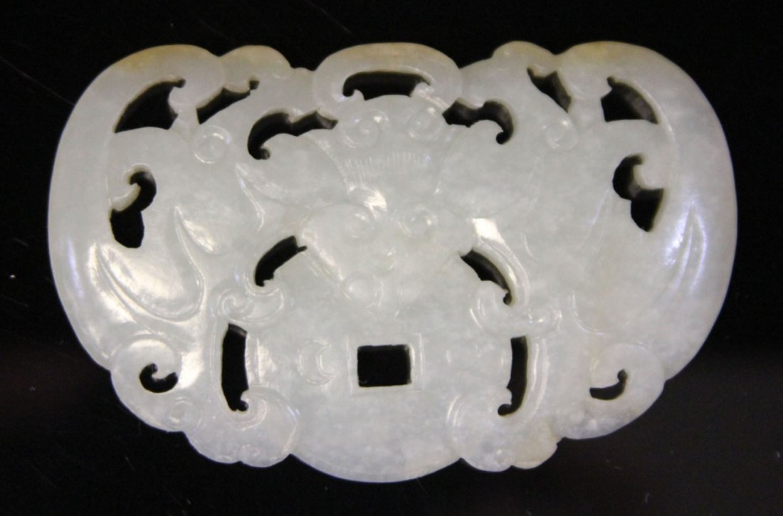 CHINESE JADE CARVING, 19TH CENTURY: Provenance- Private Collection Of East Coast Collector Bat with coin, peach skin Width- 2 3/4" Weight- 31.9 grams