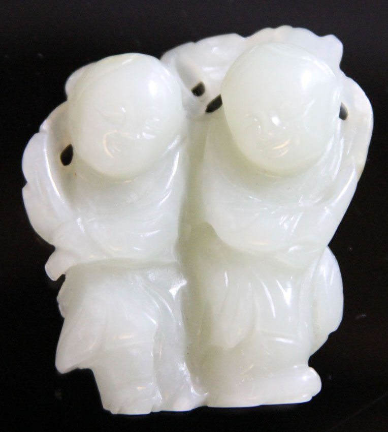 CHINESE JADE CARVING OF TWO TWINS, 19TH CENTURY: Provenance- Private Collection Of East Coast Collector Length- 1 3/4" Weight- 32.4 grams Condition- fleabite chip