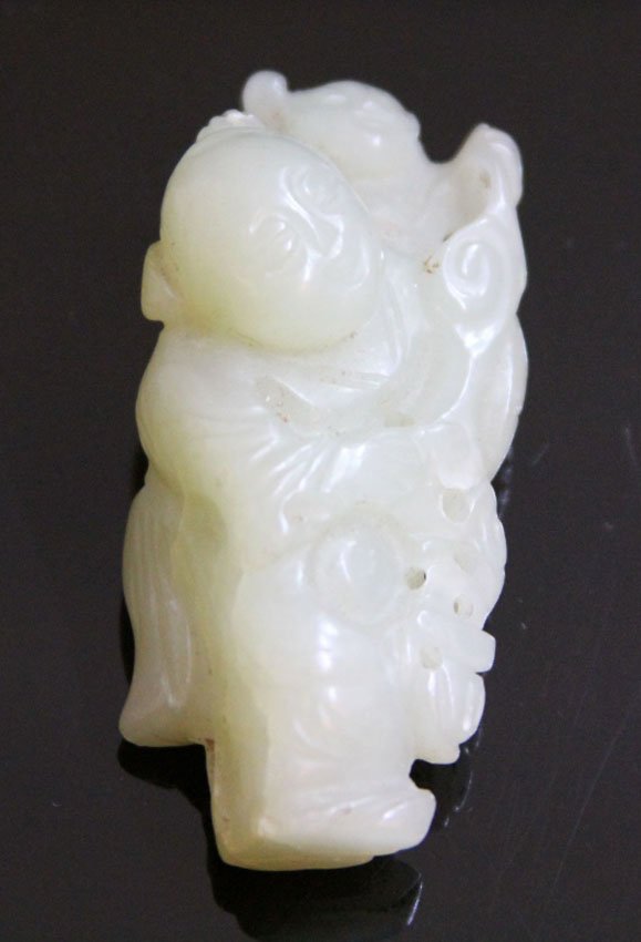 CHINESE CARVED JADE TOGGLE, 19TH CENTURY: Provenance- Private Collection Of East Coast Collector Length- 2 1/4" Weight- 36.7 grams Condition- chip on foot, around base