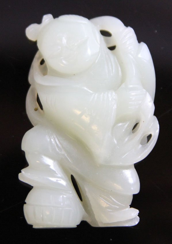 EARLY JADE CARVING OF BOY: 19th century/early 20th century Provenance- Private Collection Of East Coast Collector Length- 2 1/8" Weight- 31.7 grams