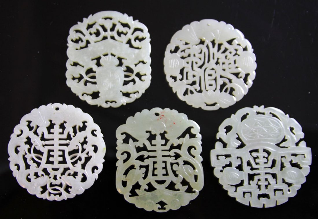 LOT OF (5) CHINESE JADE CARVINGS: 19th/early 20th century Provenance- Private Collection Of East Coast Collector Diameter- 2"- 2 1/4" Weight- 82.5 grams