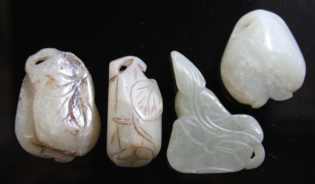 LOT OF (4) CHINESE JADE CARVINGS: 19th/early 20th century Provenance- Private Collection Of East Coast Collector Length- 2" - 2 1/2" Weight- 167.5 grams