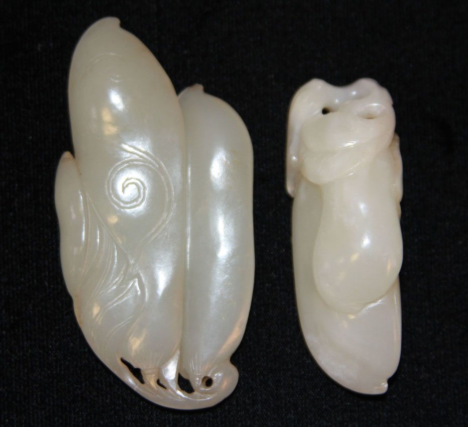 LOT OF (2) CHINESE JADE TOGGLES: 19th/early 20th century Provenance- Private Collection Of East Coast Collector Length- 2 1/4"- 3" Weight- 74.4 grams