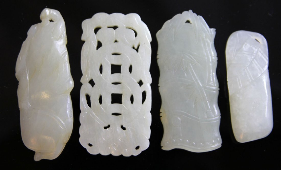 LOT OF (4) CHINESE WHITE JADE: 19th century/early 20th century Provenance- Private Collection Of East Coast Collector Length- 2"- 2 1/2" Weight- 89.2 grams
