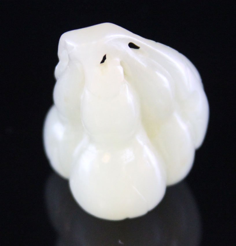 CHINESE JADE TRIPLE GOURD CARVING: 19th/early 20th century Provenance- Private Collection Of East Coast Collector Length- 1 5/8" Weight- 41.3 grams