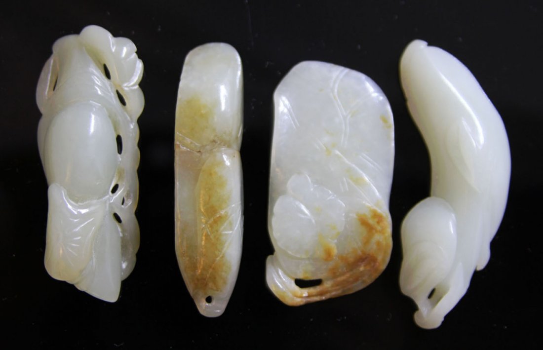 LOT OF (4) CHINESE JADE CARVINGS, 1900's: Provenance- Private Collection Of East Coast Collector some with peach skin Length- 2 1/4" - 2 3/4" Weight- 93.3 grams