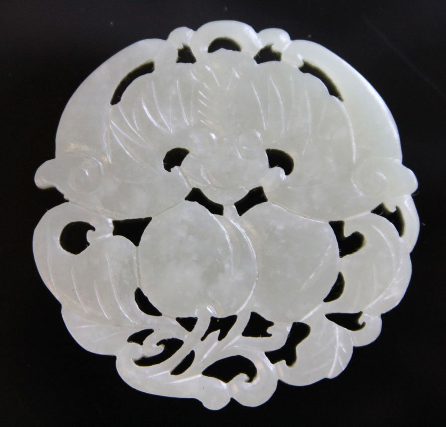CHINESE JADE PENDANT WITH BAT, 19TH CENTURY: Provenance- Private Collection Of East Coast Collector Diameter- 2 1/4" Weight- 37.3 grams