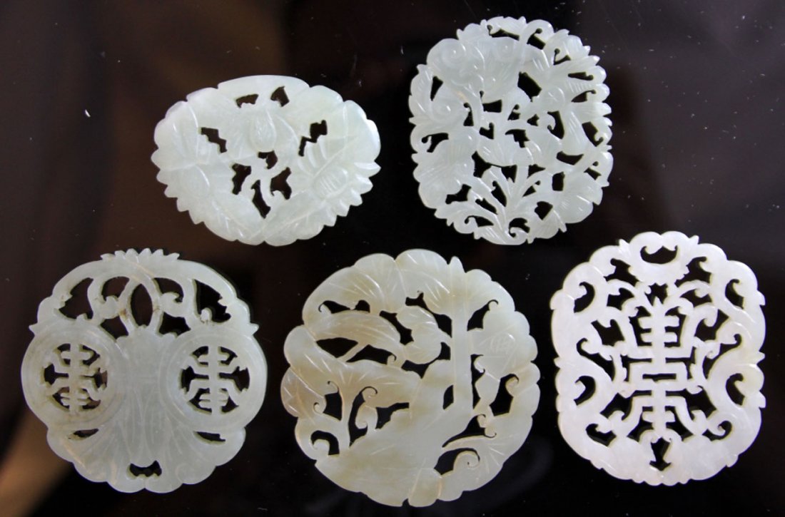 LOT OF (5) CHINESE JADE PENDANTS: 19th/early 20th century Provenance- Private Collection Of East Coast Collector Diameter- 1 7/8"- 2 1/4" Weight- 91.5 grams