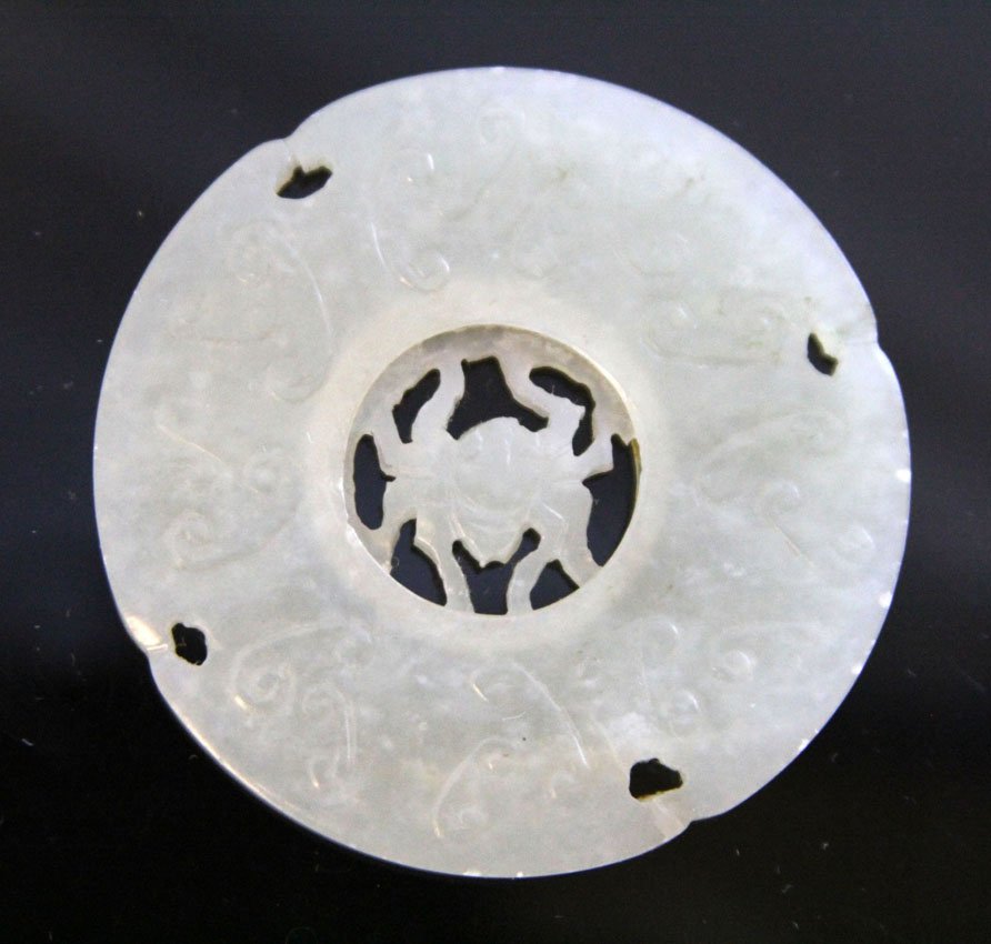 CHINESE JADE PRAYER WHEEL: 19th-20th century Provenance- Private Collection Of East Coast Collector Length- 2 1/4" Weight- 27.1 grams