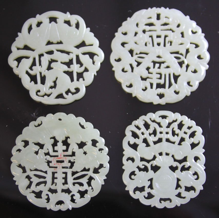 LOT OF (4) CHINESE CARVED JADE: 19th/early 20th century Provenance- Private Collection Of East Coast Collector Diameter- 1 3/4"- 2 1/4" Weight- 120.7 grams
