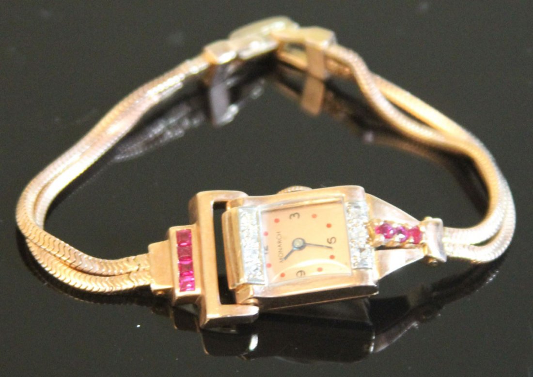 VINTAGE ROSE GOLD MONARCH LADIES WRISTWATCH: with diamond Weight- 19.6 grams Condition- appear to be in running condition