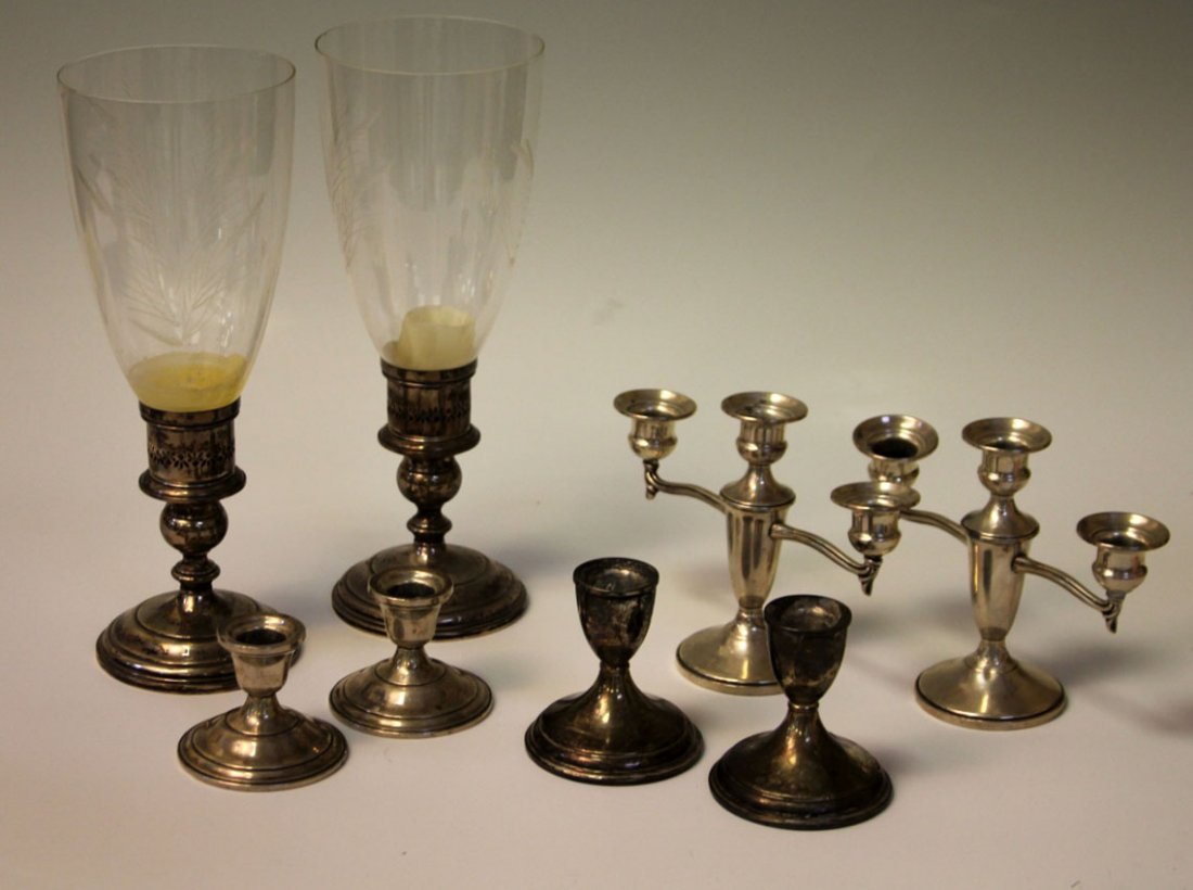LOT OF (4) PAIRS OF STERLING SILVER CANDLESTANDS: weighted bottoms Height- 2 1/2"- 5 1/2"