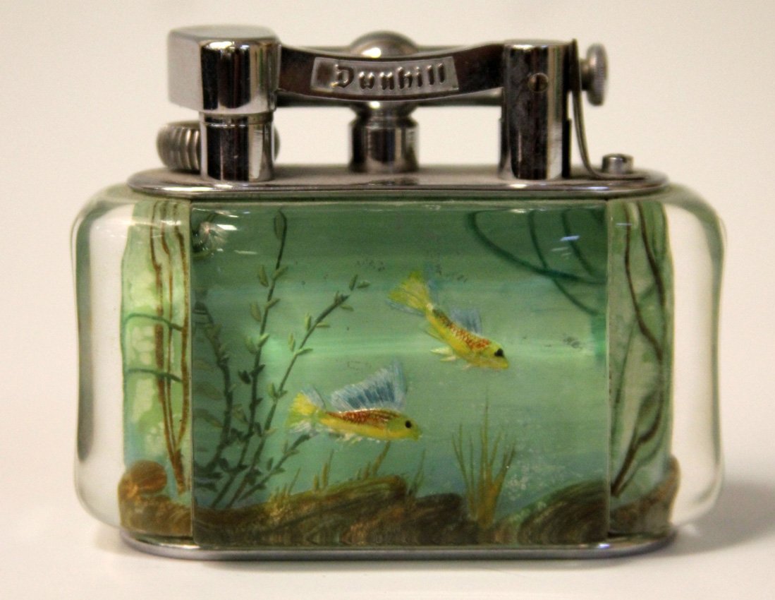 VINTAGE DUNHILL LIGHTER- LUCITE AQUARIUM: Serial no. 73/418Length- 4"Some surface scratches on metal base
