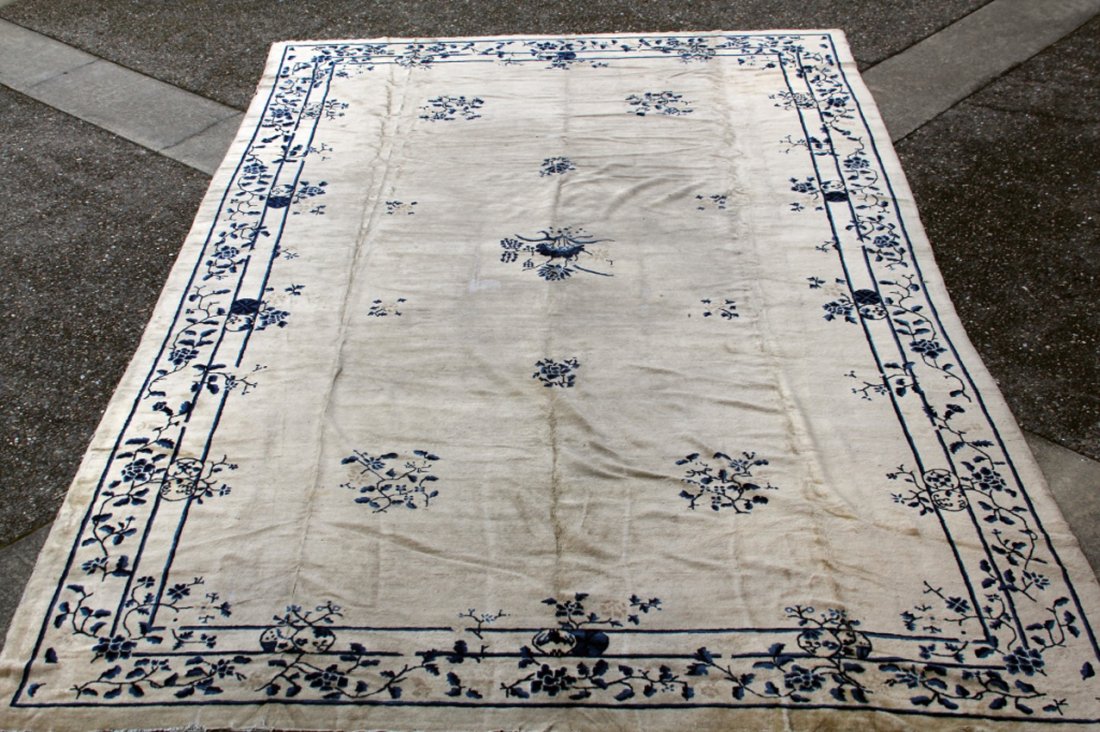 EARLY CHINESE PALACE SIZE CARPET: Overall- 128" x 208" Condition- some low pile, repairs
