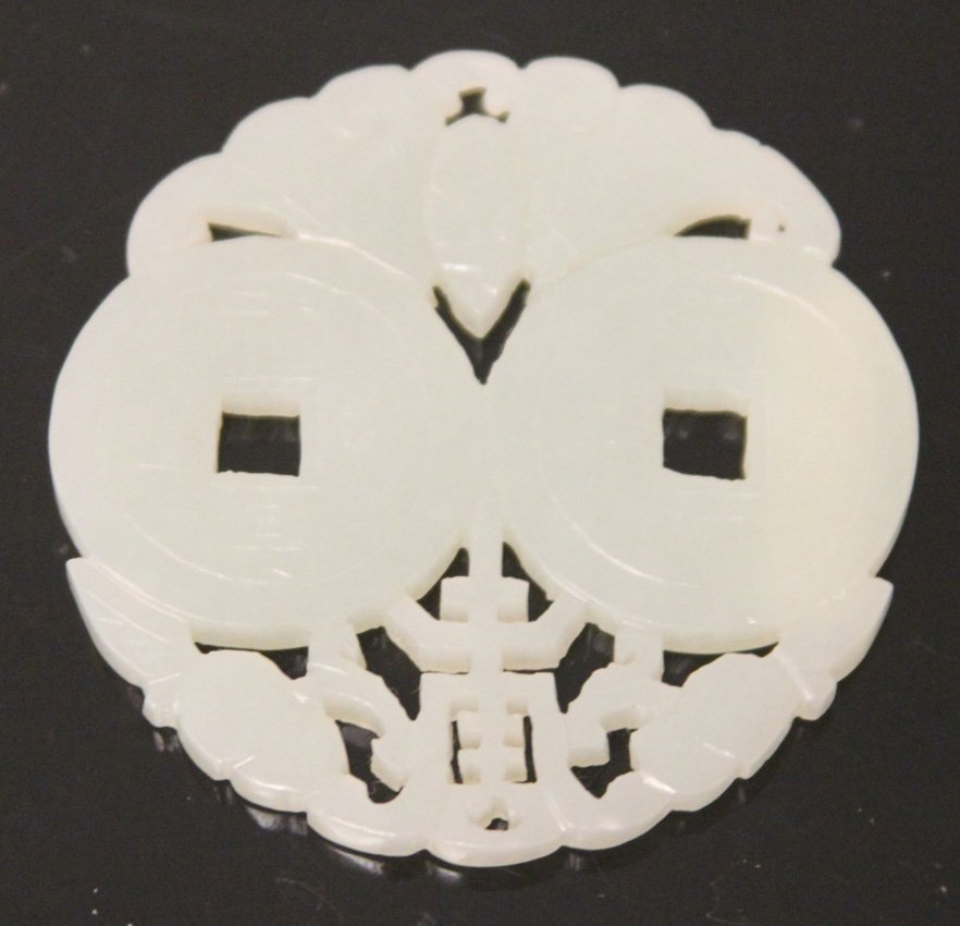 VINTAGE CHINESE JADE CARVING: Provenance- The Sutton Collection Diameter- 2 1/4" Weight- 27 grams