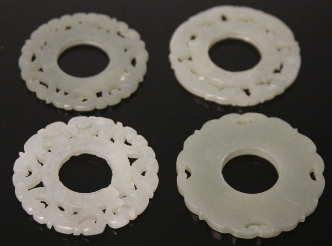 LOT OF (4) VINTAGE CHINESE JADE CARVINGS: Provenance- The Sutton Collection Diameter- 2 1/4" Weight- 91 grams