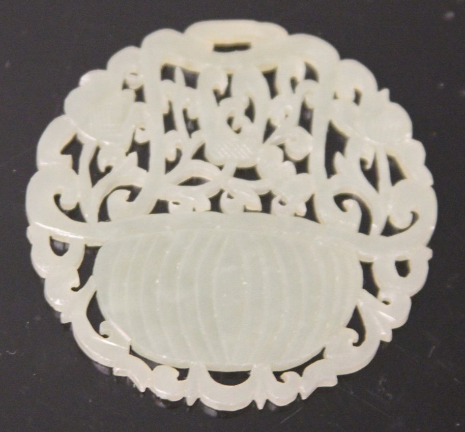 VINTAGE CHINESE JADE CARVING: Provenance- The Sutton Collection Diameter- 2" Weight- 14 grams