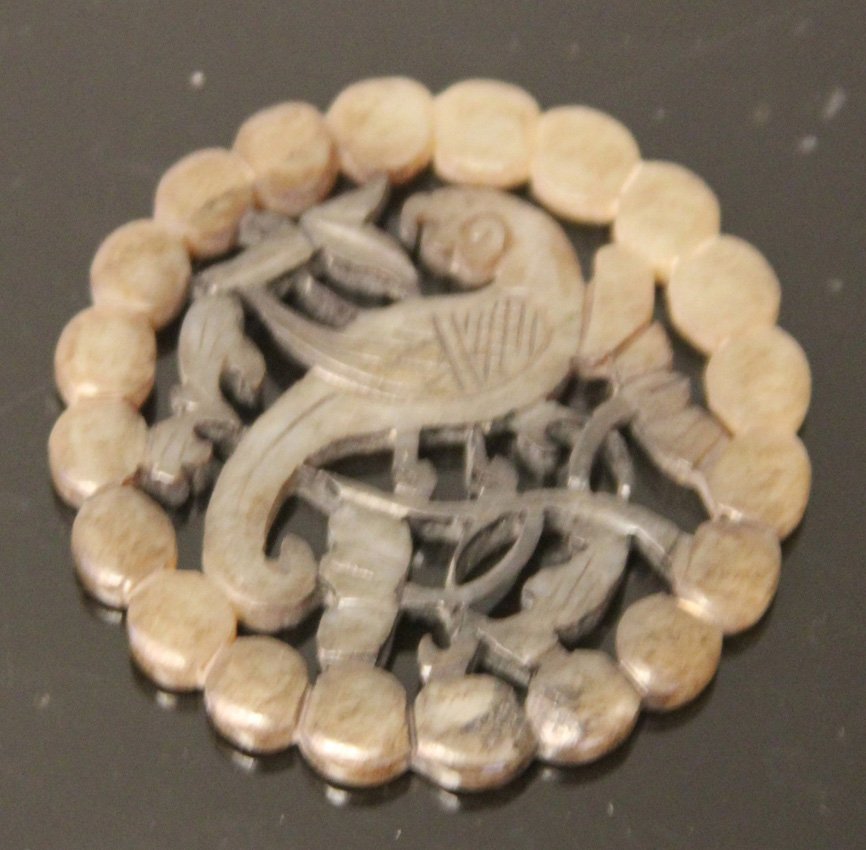 VINTAGE CHINESE JADE CARVING: Provenance- The Sutton Collection Diameter- 2" Weight- 18 grams