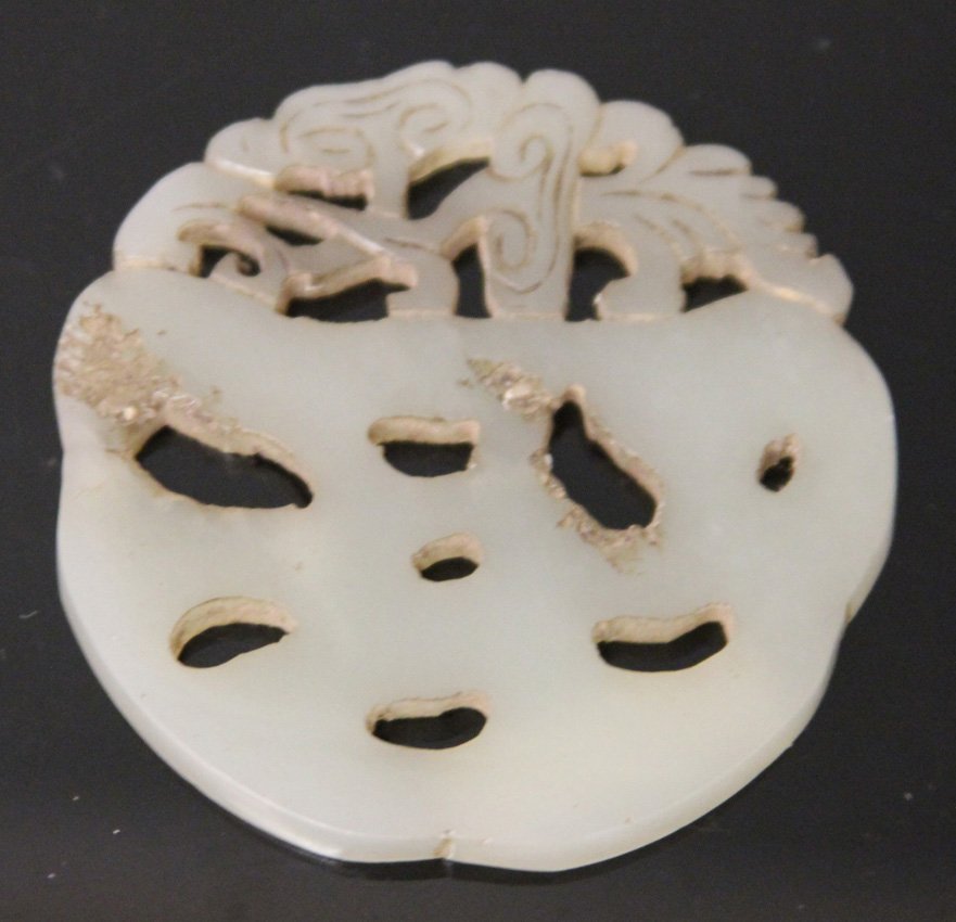 VINTAGE CHINESE JADE CARVING: Provenance- The Sutton Collection Diameter- 2 1/4" Weight- 30 grams