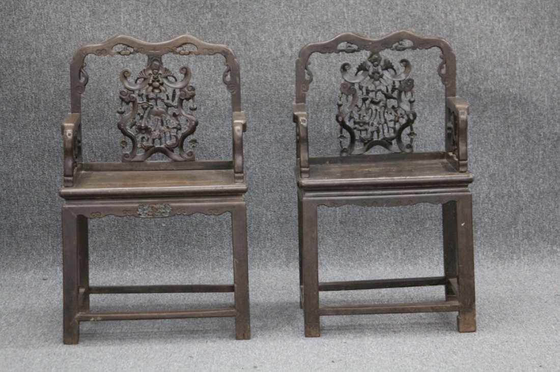 PAIR OF QING DYNASTY CARVED ARM CHAIRS: Height- 38", width- 23"