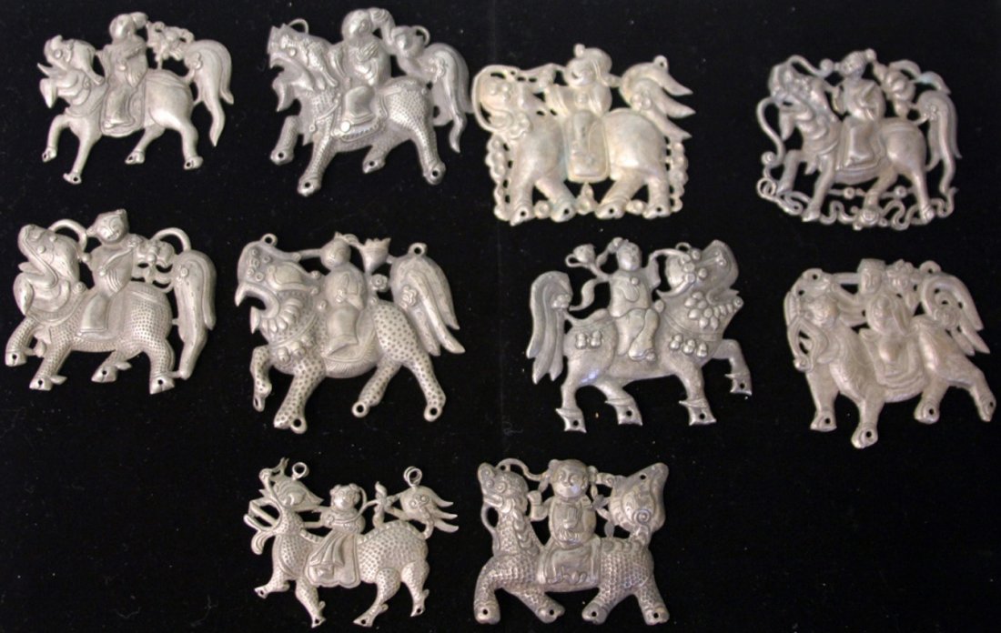 LOT OF (10) CHINESE SILVER FOO LION PENDANTS: Provenance- The Sutton Collection Weight- 166 grams