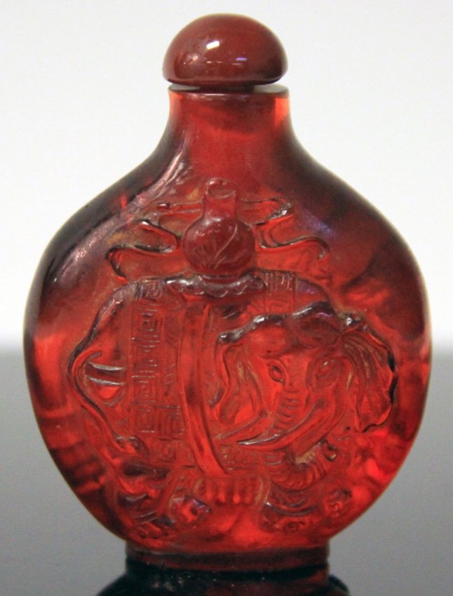 VINTAGE CHINESE CARVED AMBER SNUFF BOTTLE: Height- 2 1/2"