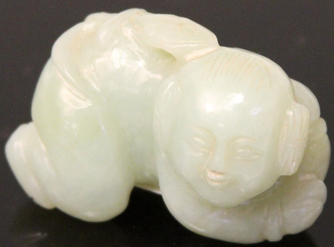 CHINESE JADE FIGURE OF BOY, 19TH CENTURY: Length- 1 1/2" Weight- 38.5 grams