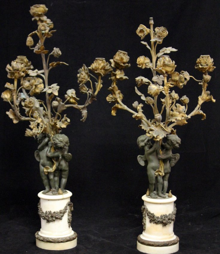 PAIR OF FRENCH CAST BRONZE CANDLEABRAS, 1890: with marble bases Height- 29" Condition- missing on rose pedal