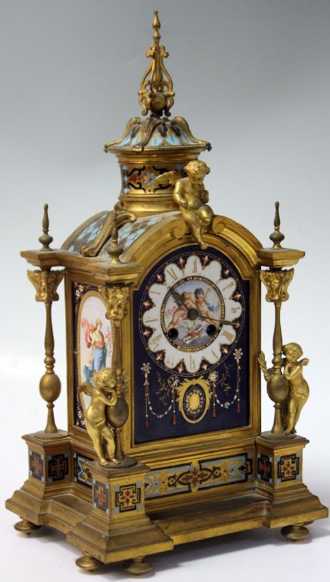 FRENCH CHAMPLEVE DORE BRONZE AND PORCELAIN CLOCK: 19th century Height- 17"