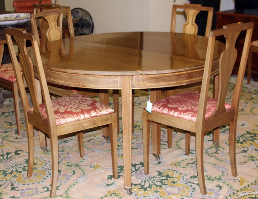 REGENCY MAHOGANY INLAID DINING ROOM SET: with (7) chairs, (5) table leaves Diameter of table- 54"
