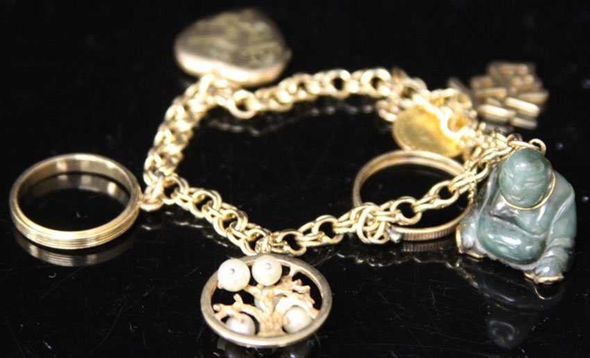 VINTAGE LADY'S CHARM BRACELET, SOME 14KT (1 of 2)