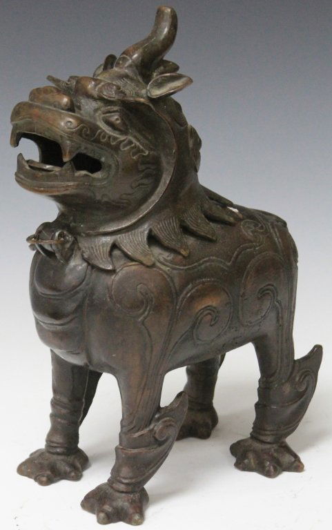 VINTAGE TIBETAN BRONZE FORM OF LION (1 of 5)