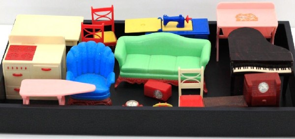 16 pc's of Renwal Doll Furniture: Beautiful sewing mach. #89, Sofa #78, Barrel Chair #77, Piano #74, Bathanet #122, Iron Board #32, Kitchen Table #67, 3 Chairs #63, Stove, oven, door opens #69, Radio #16, Phone (no string)#28, Radio #