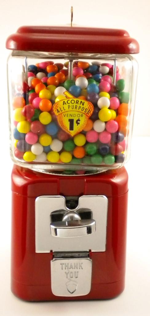 One-cent Acorn Vending Machine: Fully restored 1960s Acorn 1-cent vending machine. Will vend gum or candy. Has embossed acorn on back of glass globe.