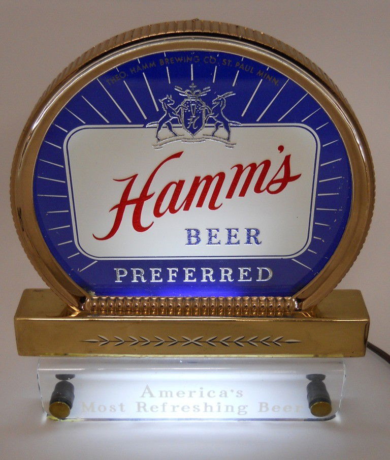 Hamm's Beer Lighted Counter Sign: 9-1/4" x 8" x 5". This is a lighted cash register sign for Hamm's Preferred Beer from Saint Paul, Minnesota. This has a reverse glass painted top with a metal and plastic base. It is 100% original and