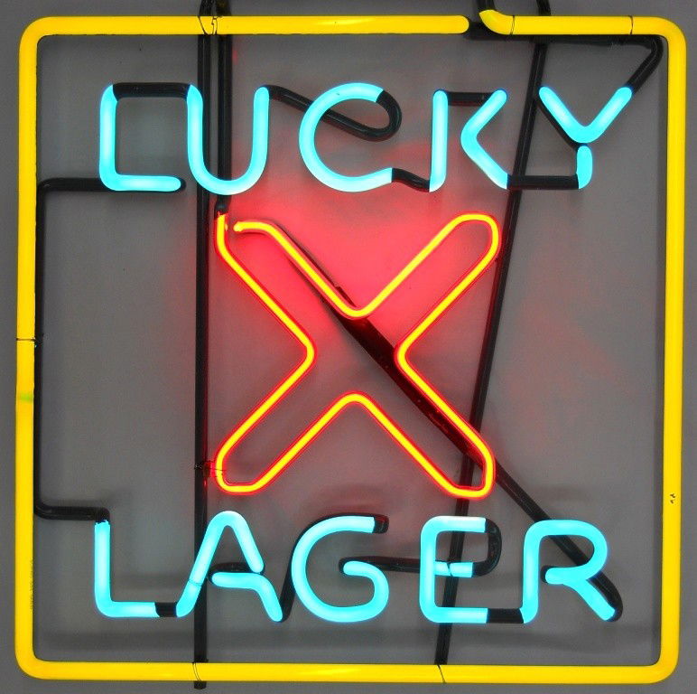 Lucky Lager Beer "X" Neon Sign: This hanging-style neon sign is a beautiful with teal, red and yellow colors. The consignor thought it was new old stock and it looks unused. This does not include a transformer to light the sign; you