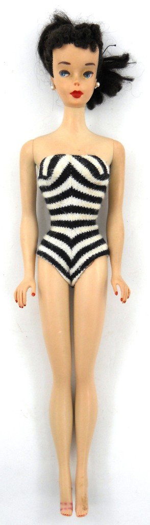 Vintage 1960 Original Barbie #3: Right from the cedar chest to our auction is this 1960 #3 brunette Barbie doll, complete with the original swimsuit, pearl earrings, and a Barbie booklet showing this doll and many others. The hair an
