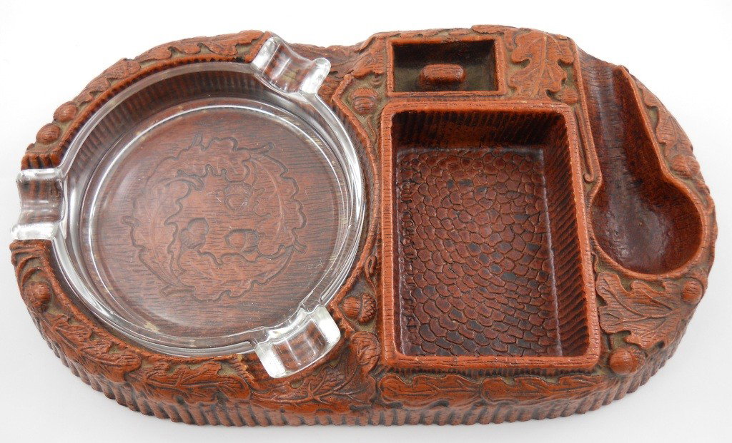 Syroco Wood Pipe Stand / Ashtray Combination: This is a large, vintage Syroco wood pipe stand / ashtray combo. The wood is carved with beautiful details of acorns and oak leaves. The original glass ashtray is still intact (often times this is mis