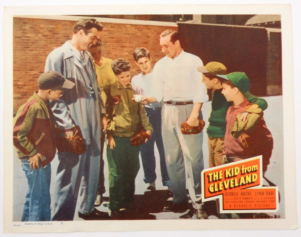 Lobby Card #7 "The Kid from Cleveland": This is lobby card #7 from the movie "The Kid from Cleveland". It shows Bob Feller showing some young kids how he holds the ball when he pitches. Like New. 11" x 14".
